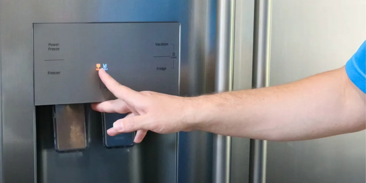 where is the filter reset button on ge refrigerator