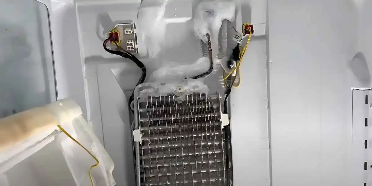 why does my fridge fan keep freezing up