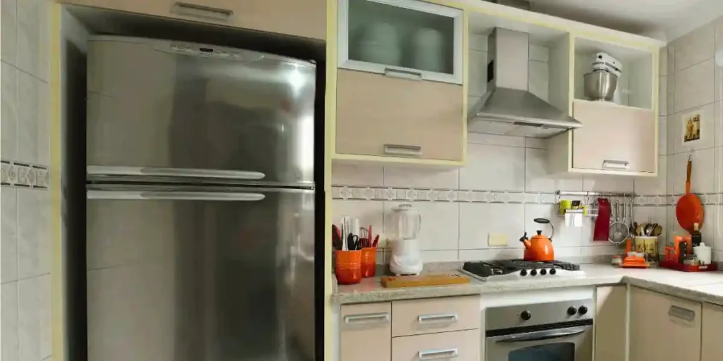how much space is between the refrigerator and the side wall