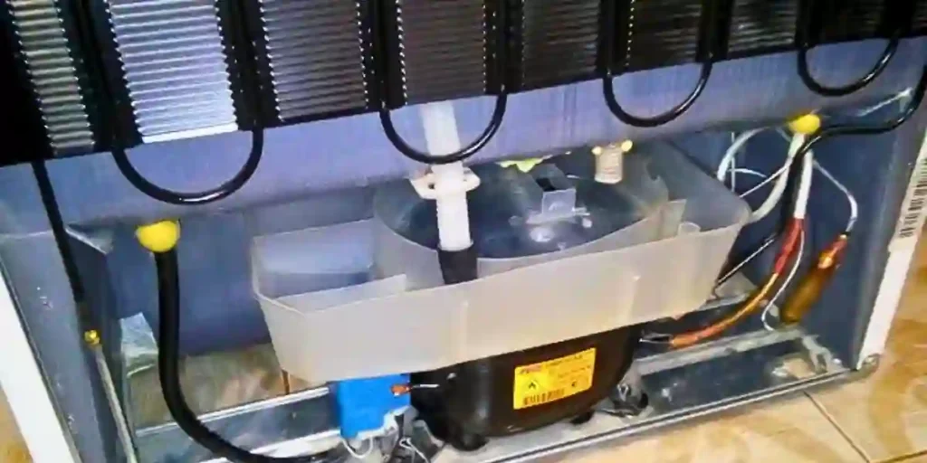 refrigerator drain pan full of water