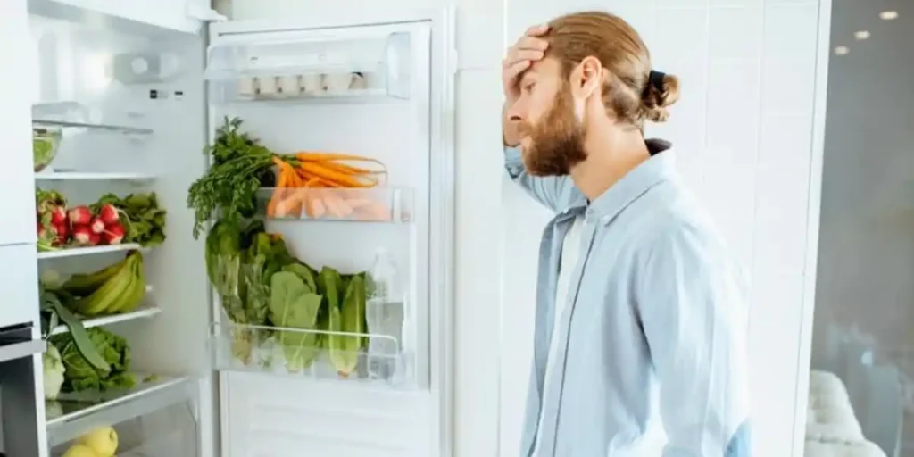 refrigerator gets warm then cold again