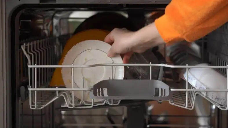 Can You Use The Sink While The Dishwasher Is Running? 1 Jammed Dishwasher