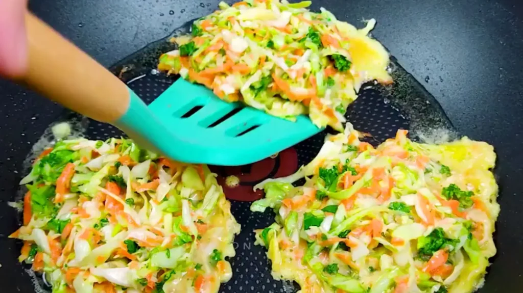 What Are Spatulas Used For? 25 Surprising Ways to Use Them 3 Turning over Food like Pancakes, Patties, or Vegetables